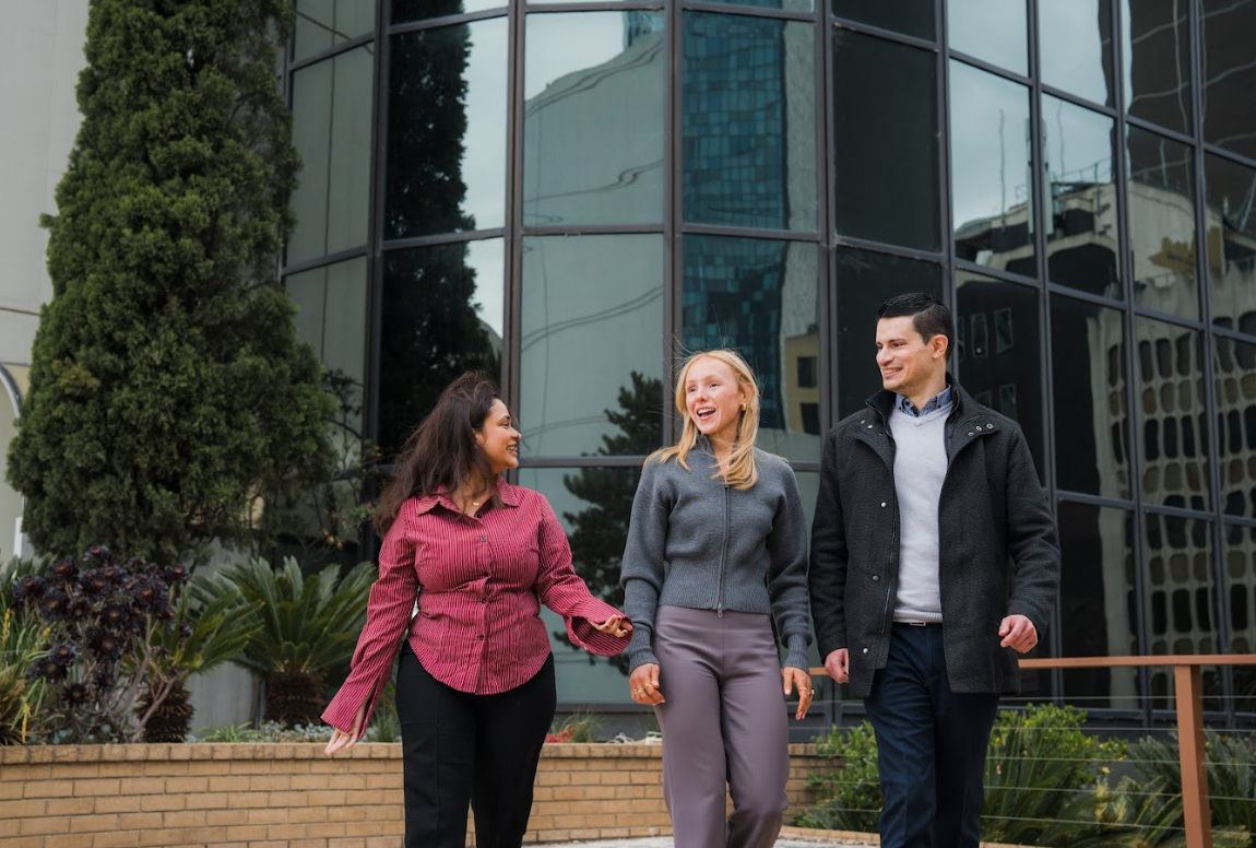 Picture of someone walking and their bag.